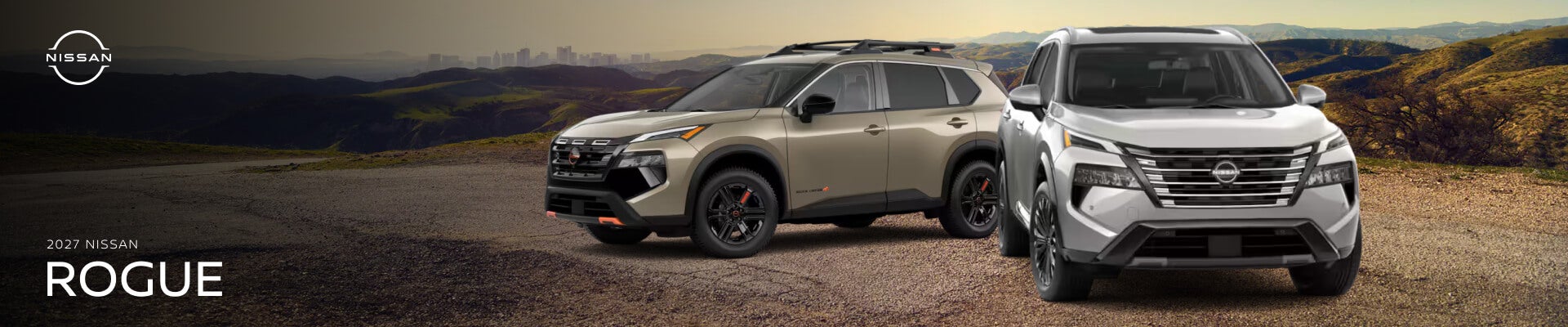 Side and front views of one brown and one silver 2027 Nissan Rogue parked in a desert clearing.
